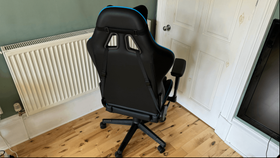 The back of a black and blue compuer chair